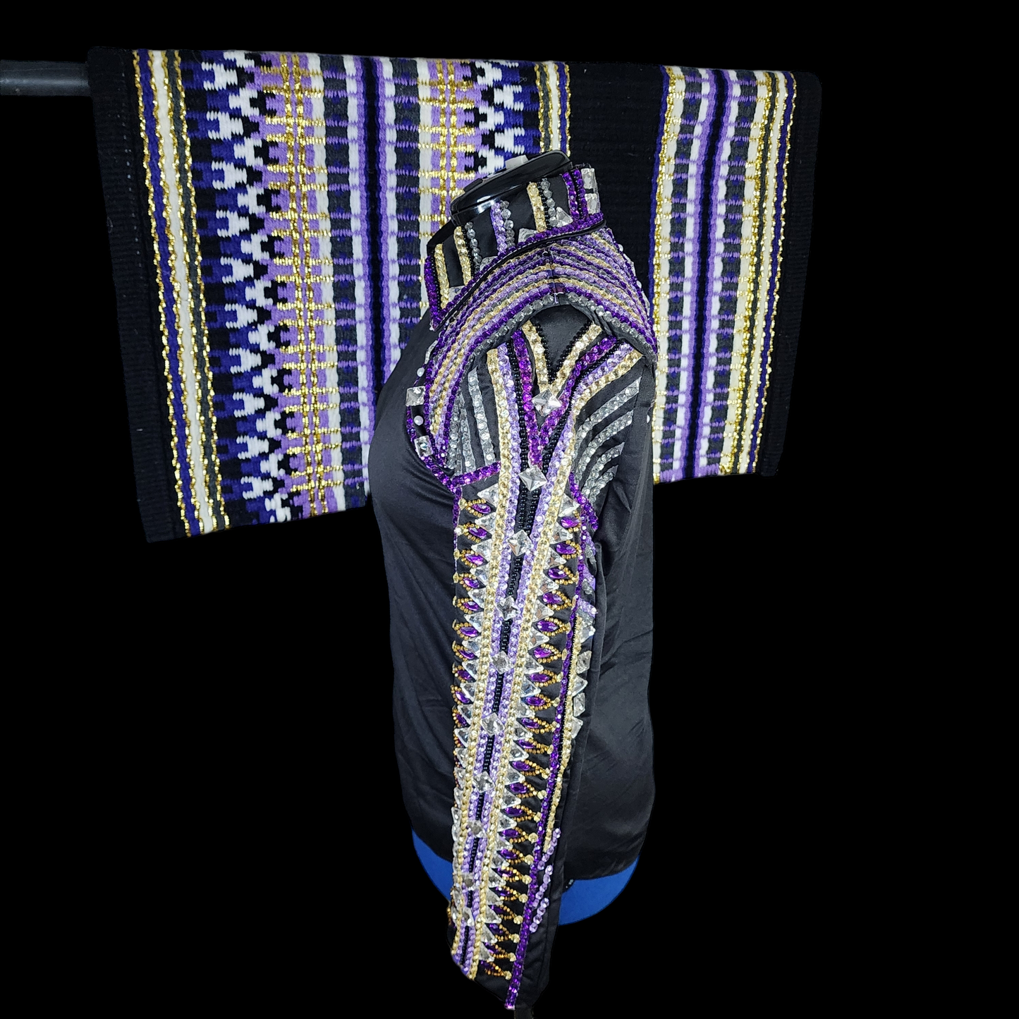 A Large black base with purple horsemanship top