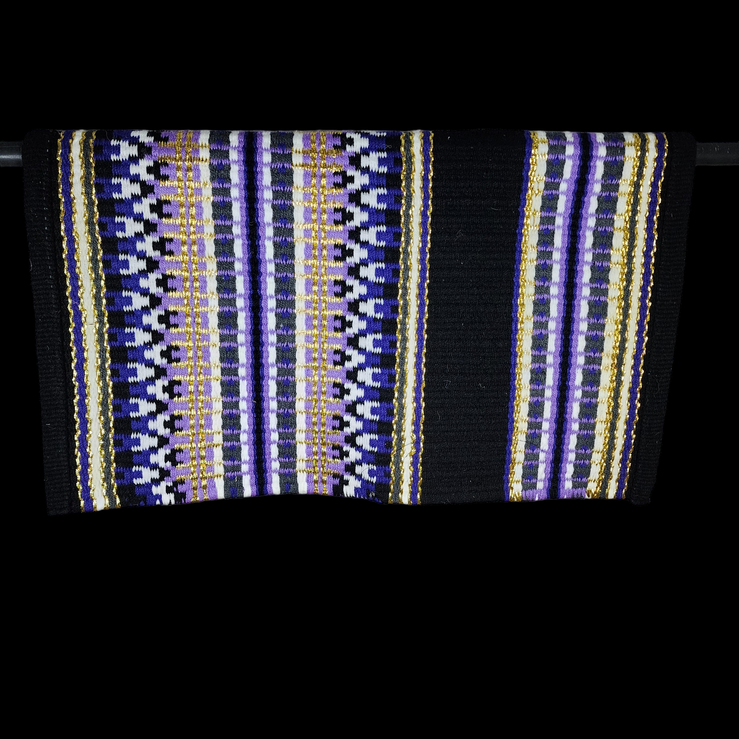 A Large black base with purple horsemanship top